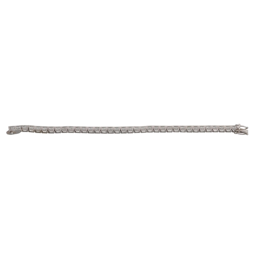 35 - A DIAMOND LINE BRACELET, the brilliant cut diamonds in square box settings, mounted in 14ct white go... 