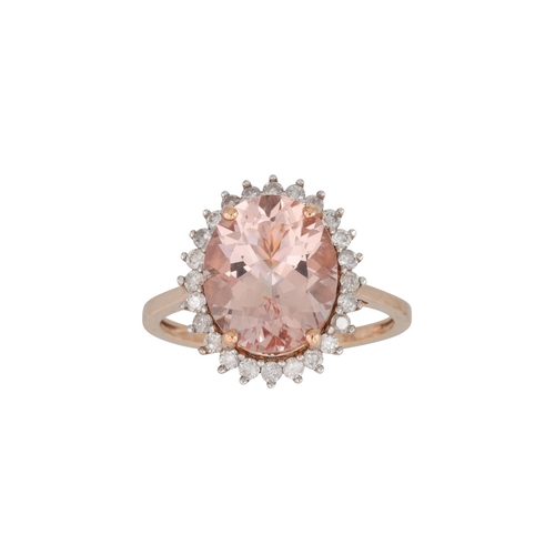 350 - A MORGANITE AND DIAMOND CLUSTER RING, the oval morganite to a brilliant cut diamond surround, mounte... 