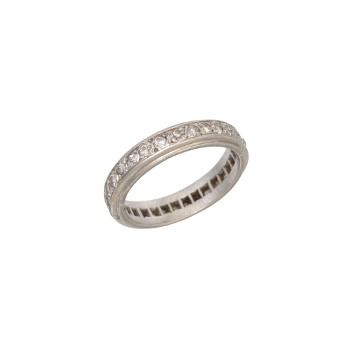 353 - AN ANTIQUE DIAMOND ETERNITY RING, the old cut diamond mounted in platinum. Estimated: weight of diam... 