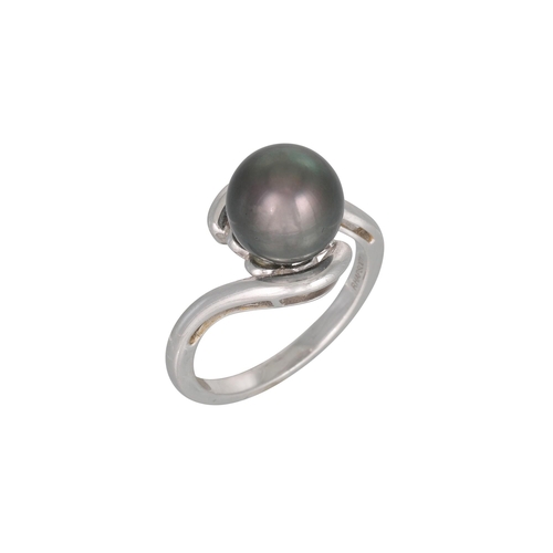 354 - A PEARL SINGLE STONE RING, of twist design, mounted in platinum, size O