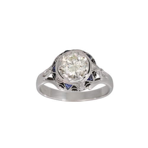 372 - A DIAMOND SOLITAIRE RING, the circular diamond to white gold sapphire set mount. Estimated: weight o... 