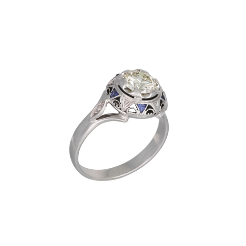 372 - A DIAMOND SOLITAIRE RING, the circular diamond to white gold sapphire set mount. Estimated: weight o... 