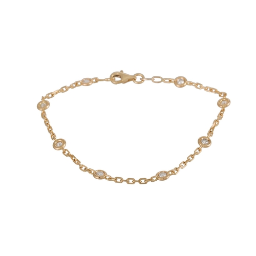 389 - A DIAMOND BRACELET, the collet set brilliant cut diamonds linked by an 18ct yellow gold chain. Estim... 