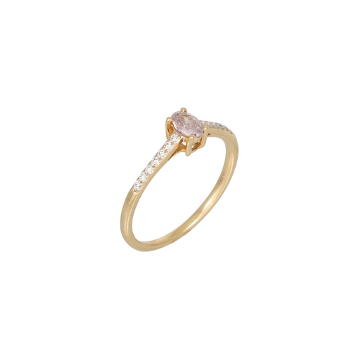 397 - A PINK DIAMOND RING, the oval stone to diamond shoulders, in 18ct yellow gold. Estimated: weight of ... 