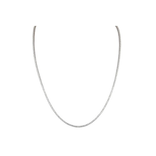 402 - A DIAMOND LINE NECKLACE, the brilliant cut diamonds mounted in 14ct white gold. Estimated: weight of... 