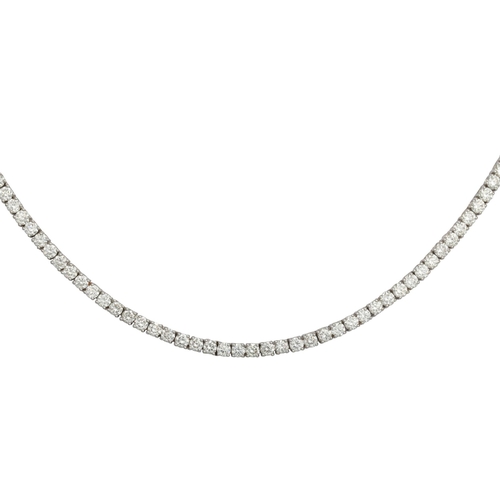 402 - A DIAMOND LINE NECKLACE, the brilliant cut diamonds mounted in 14ct white gold. Estimated: weight of... 