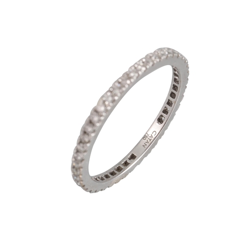 411 - A DIAMOND ETERNITY RING, the brilliant cut diamonds mounted in 18ct white gold. Estimated: weight of... 