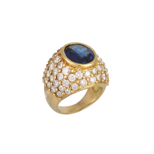 415 - A FINE QUALITY SAPPHIRE AND DIAMOND BOMBE CLUSTER RING, the oval sapphire to a pave diamond mount, F... 