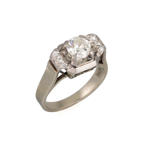 416 - AN ART DECO DIAMOND RING, the old cut diamond to a square mount, diamond shoulders, French hallmarks... 