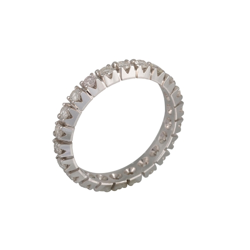 417 - A DIAMOND ETERNITY RING, the brilliant cut diamonds mounted in 18ct white gold. Estimated: weight of... 