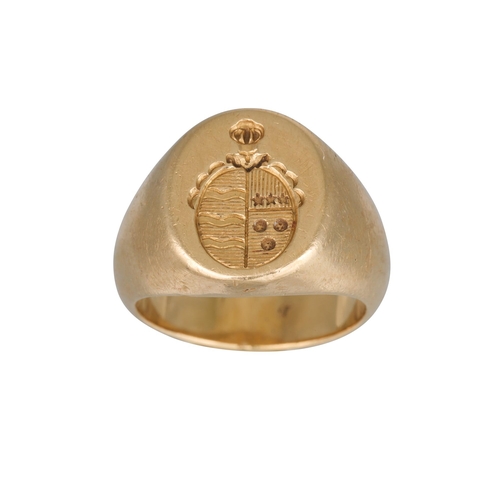 419 - AN ANTIQUE MAUBOUSSIN GOLD SIGNET RING, with crest, signed 'Mauboussin, Paris', 11.8 g. Size: F