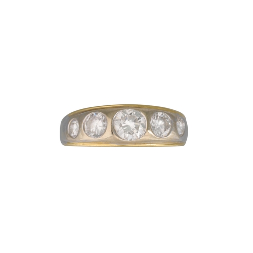 428 - A FIVE STONE GRADUATED DIAMOND SET RING, the brilliant cut diamonds mounted in white and yellow gold... 