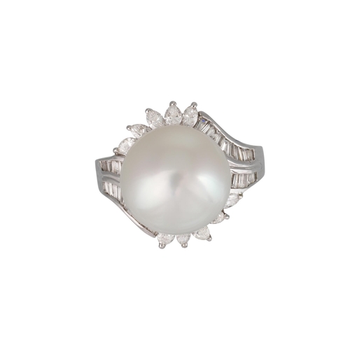 430 - A SOUTH SEA PEARL AND DIAMOND SET RING, the central pearl to a marquise and baguette diamond surroun... 