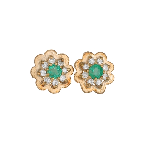 44 - A PAIR OF DIAMOND AND EMERALD CLUSTER EARRINGS, in the form of flowers, mounted in yellow gold