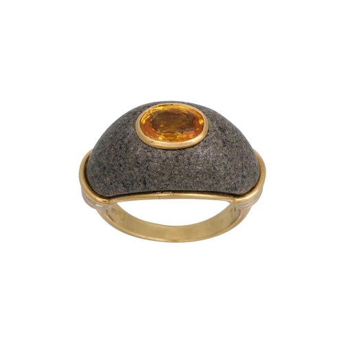 442 - A VINTAGE CARTIER YELLOW SAPPHIRE AND BLACK LAVA DOME RING, mounted in 18ct gold, signed Cartier, si... 