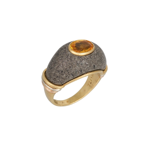 442 - A VINTAGE CARTIER YELLOW SAPPHIRE AND BLACK LAVA DOME RING, mounted in 18ct gold, signed Cartier, si... 