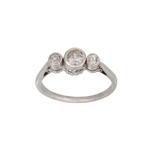 446 - A VINTAGE THREE STONE DIAMOND RING, the old cut diamonds collet set in white gold, size J - K