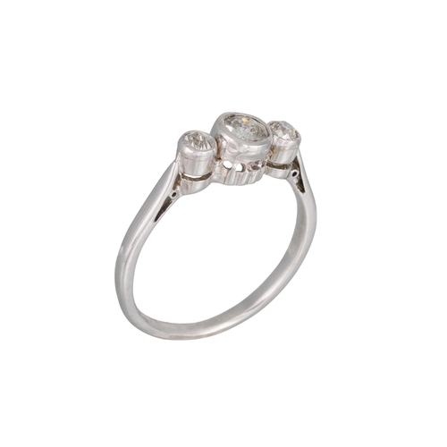 446 - A VINTAGE THREE STONE DIAMOND RING, the old cut diamonds collet set in white gold, size J - K