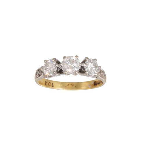 448 - A THREE STONE DIAMOND RING, the brilliant cut diamonds mounted in 18ct white gold. Estimated: weight... 