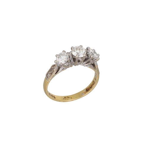 448 - A THREE STONE DIAMOND RING, the brilliant cut diamonds mounted in 18ct white gold. Estimated: weight... 