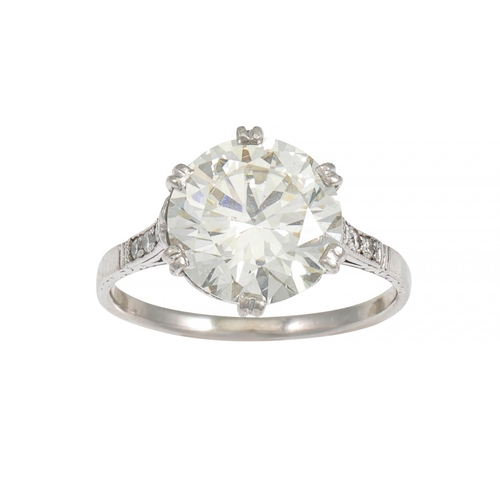 458 - ***WITHDRAWN***A DIAMOND SOLITAIRE RING, the brilliant cut diamond in diamond set white metal. Estim... 