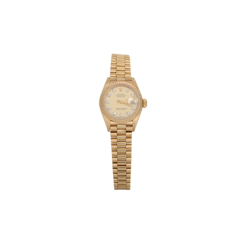 492 - A LADY'S 18CT GOLD ROLEX OYSTER PERPETUAL DATE JUST WRIST WATCH, diamond dot dial over champagne fac... 