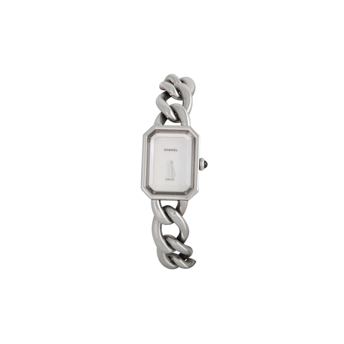 517 - A LADY'S STAINLESS STEEL CHANEL WRIST WATCH, curb link bracelet strap, mother-of-pearl dial, box and... 