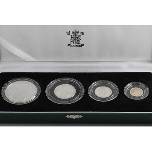 552 - A 2003 SILVER PROOF BRITANNIA ENGLISH FOUR COIN SET, £2 to 20p. Together with five £20 silver Englis... 