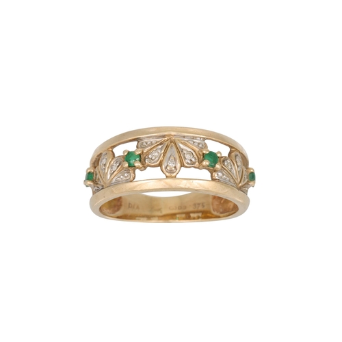 59 - AN EMERALD AND DIAMOND RING, mounted in 9ct gold, size L