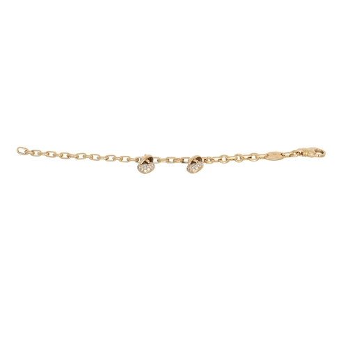 6 - AN 18CT GOLD CHAUMET BRACELET, with two matching diamond set Chaumet heart pendants attached, 27.4 g... 