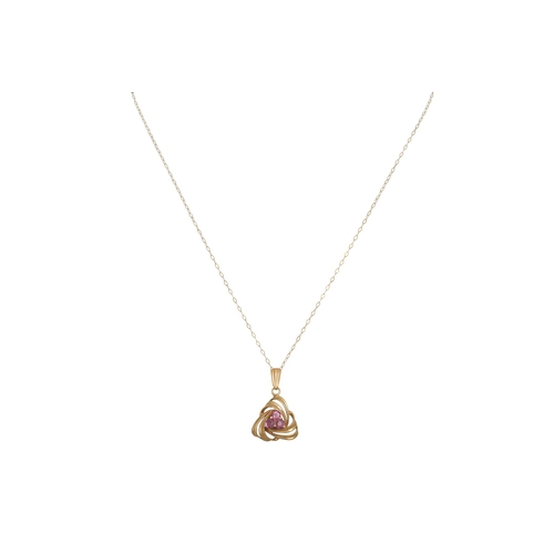 64 - A MIXED LOT: Consisting of a gold and pink sapphire pendant and chain, a 9ct gold and amethyst ring ... 