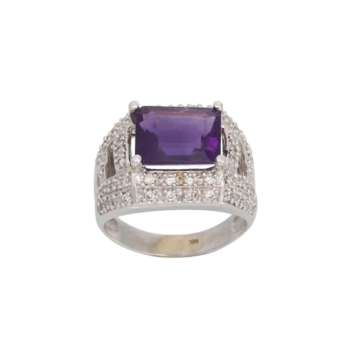 83 - A DIAMOND AND AMETHYST RING, the rectangular amethyst to pave diamond shoulders and surround, mounte... 