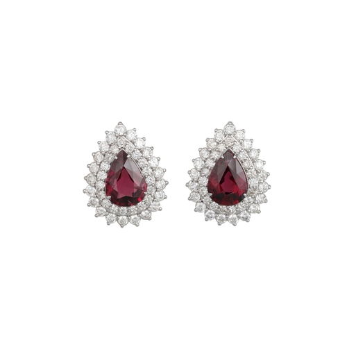 95 - A PAIR OF DIAMOND AND GARNET CLUSTER EARRINGS, the large pear shaped garnet to diamond surround, mou... 