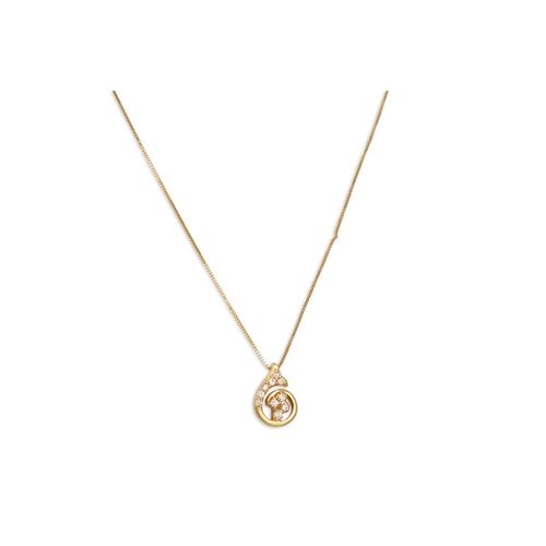 10 - A DIAMOND CLUSTER PENDANT, mounted in 18ct yellow gold, to a 18ct yellow gold trace chain, stamped U... 