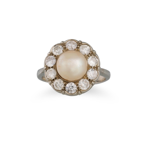 303 - A VINTAGE PEARL AND DIAMOND CLUSTER RING, mounted in 18ct white gold. Estimated: weight of diamonds:... 