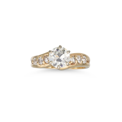 305 - A DIAMOND SOLITAIRE RING, the round brilliant cut diamond set to six diamond set shoulders mounted i... 