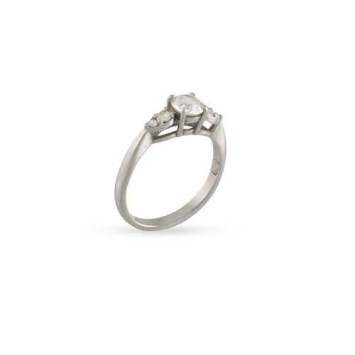 307 - A DIAMOND SOLITAIRE RING, the brilliant cut diamond to diamond shoulders, mounted in platinum. Estim... 