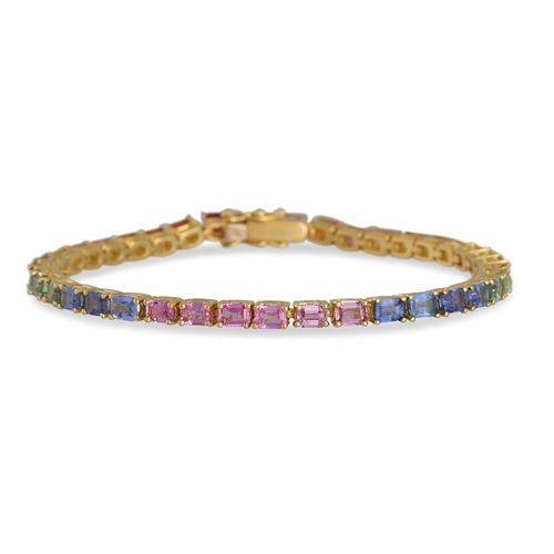 128 - A MULTI COLOURED SAPPHIRE 'RAINBOW' BRACELET, mounted in 18ct yellow gold. Estimated: weight of sapp... 