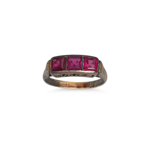 134 - A VINTAGE RUBY RING, the French cut stones in 14ct gold. Estimated: weight of rubies: 0.75 ct. size ... 