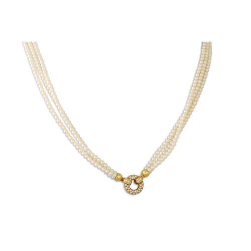 11 - A TRIPLE ROW CULTURED PEARL NECKLACE, with 18ct yellow gold and diamond set clasp, with Weirs box. E... 