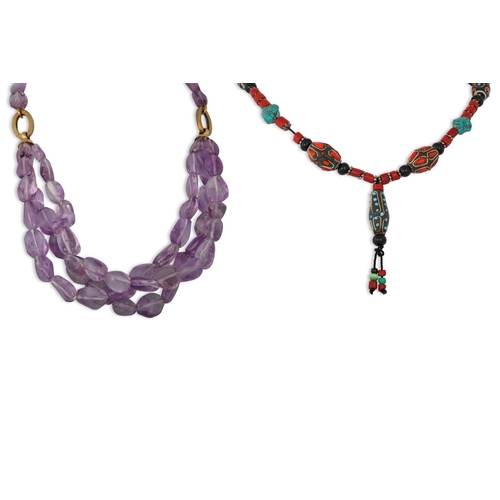 129 - AN AMETHYST BEADED NECKLACE, together with another beaded necklace