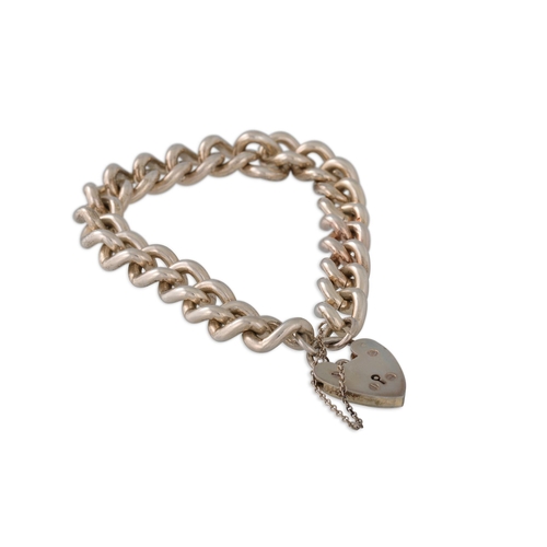 19 - A HEAVY SILVER FLAT CURB BRACELET, with padlock , 63 g