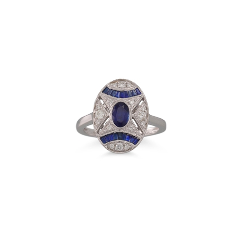 29 - AN ART DECO STYLE DIAMOND AND SAPPHIRE RING, of oval plaque form, mounted in 18ct gold, size N - O