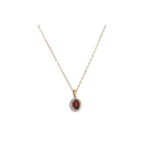 33 - A GARNET PENDANT, the oval garnet mounted in 9ct gold, on a chain