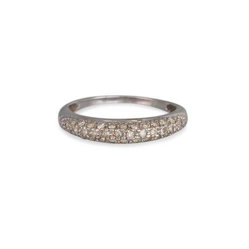 376 - A DIAMOND RING, pavé set in white metal, size K