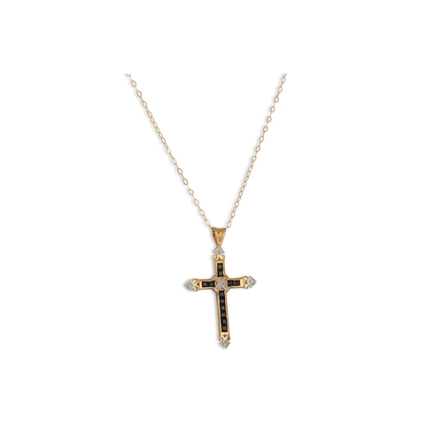 38 - A DIAMOND & SAPPHIRE CROSS, mounted in 9ct gold on a chain