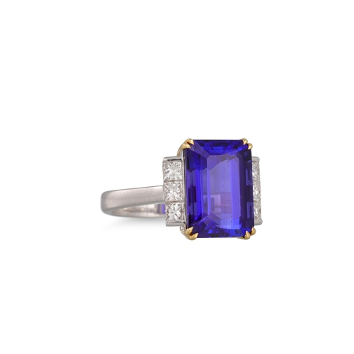 384 - A TANZANITE RING, the rectangular stone to diamond shoulders. Estimated: weight of tanzanite: 8.19 c... 