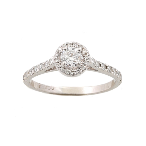 58 - A DIAMOND 'HALO' CLUSTER RING, the round brilliant cut diamond to a diamond halo surround, diamond s... 