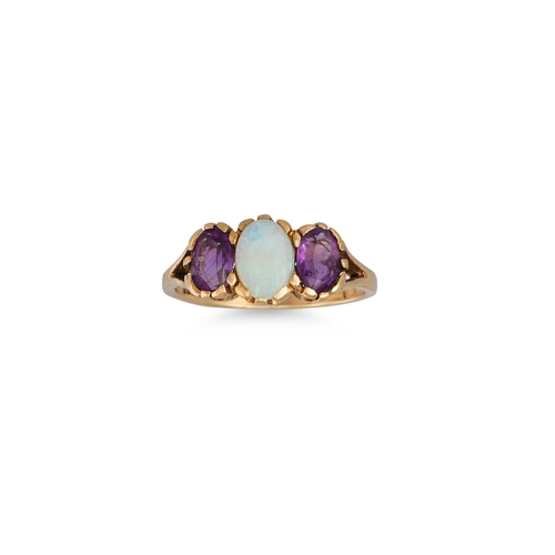 67 - A VINTAGE THREE STONE OPAL AND AMETHYST RING, mounted in 9ct yellow gold, size L