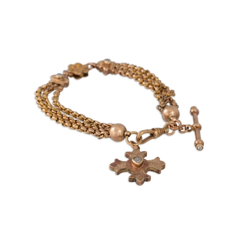 7 - AN ANTIQUE GOLD BRACELET AND T-BAR, suspending a gold cross and pear shaped old cut diamond